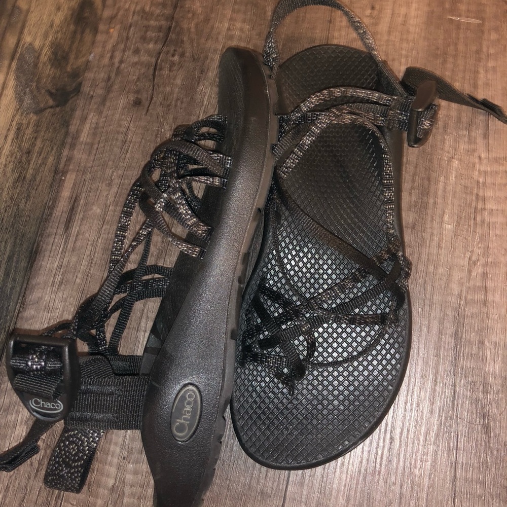 Black lacy Chacos.